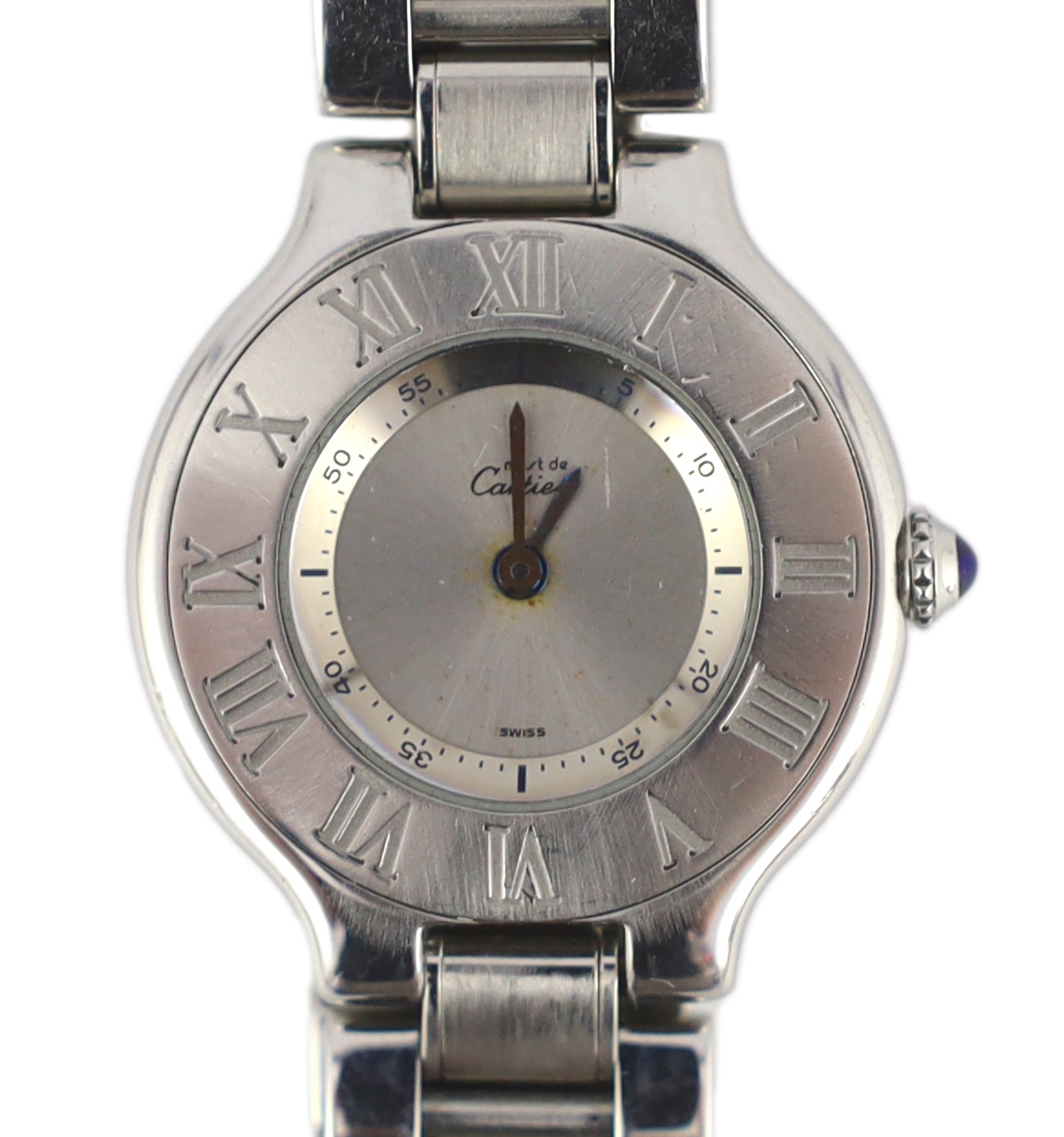 A lady's modern stainless steel Must de Cartier 21 quartz wrist watch, on a stainless steel Cartier bracelet